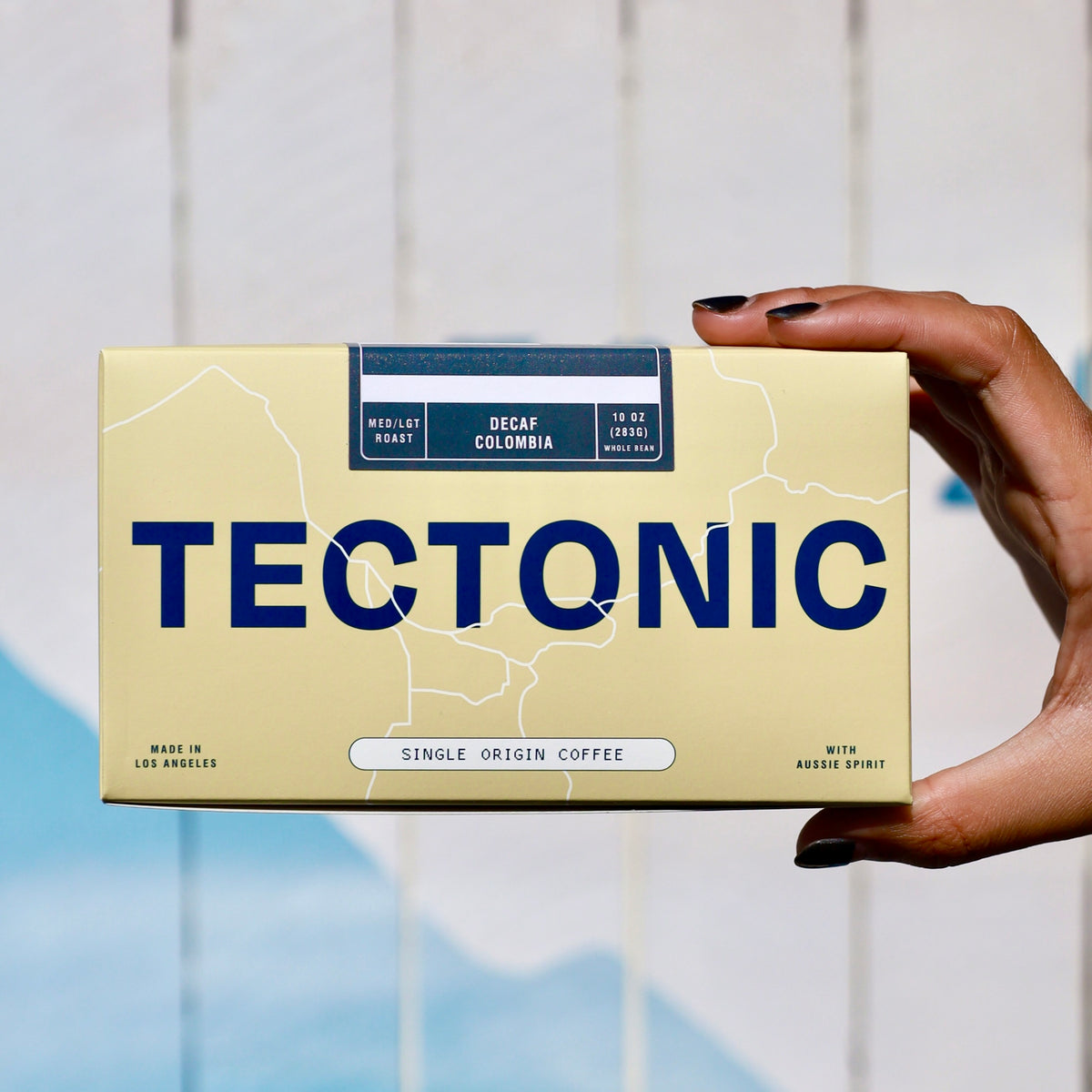 Tectonic Coffee DECAF Colombia Cauca 10oz packaging, front view; whole bean packaging shown.