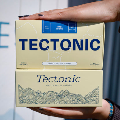 Tectonic Coffee Seismic Brazil dark roast 10oz packaging, alternate view; whole bean packaging shown.