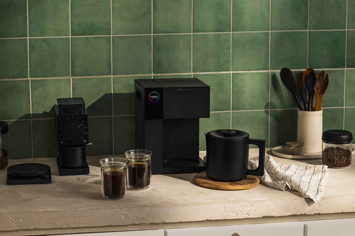 Matte Black Fellow Aiden and thermal carafe on a kitchen counter