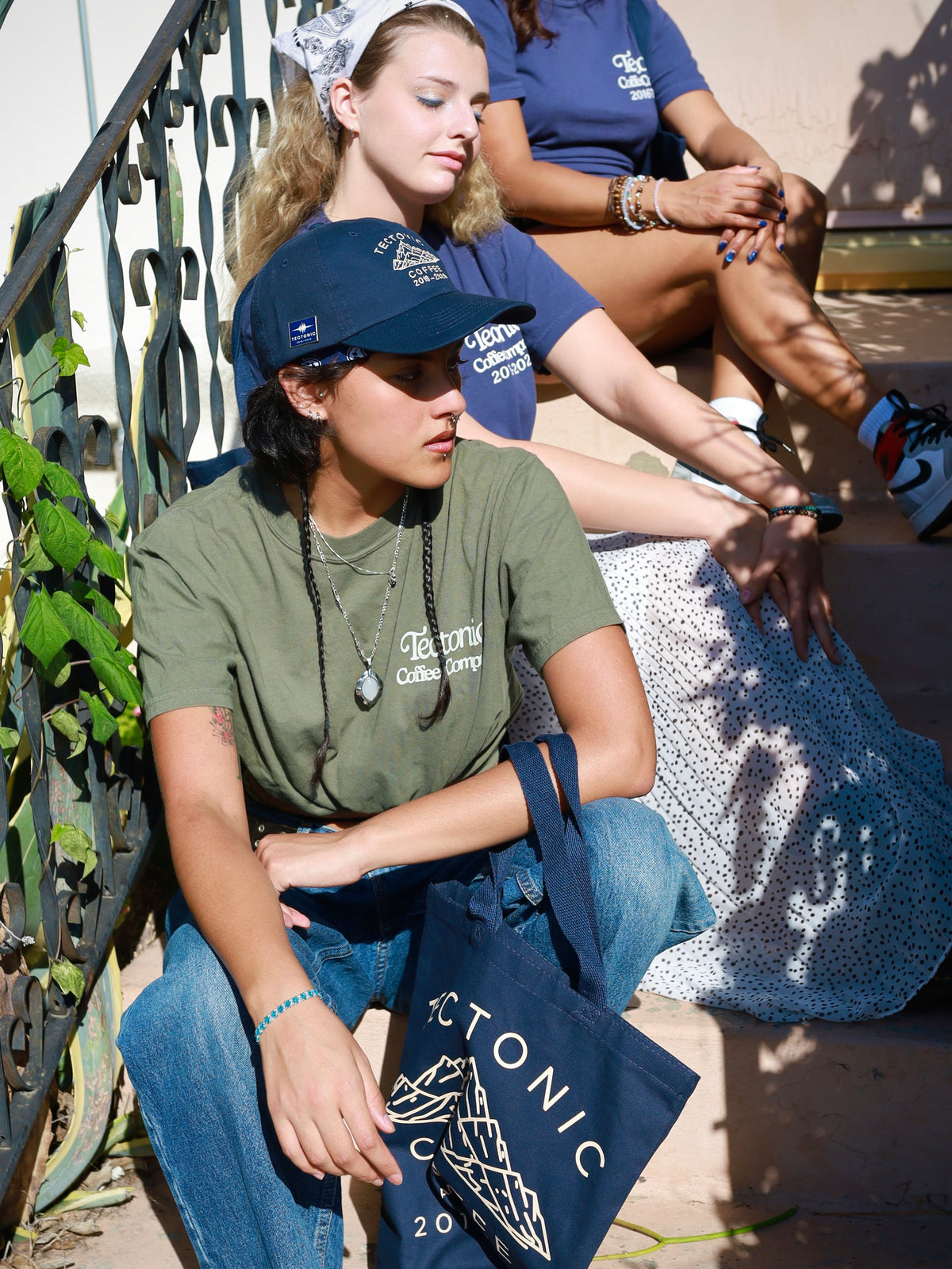 Front of the adult olive Keep It Bogan (Baby!) T-shirt with cream chest logo; hat and tote sold separately